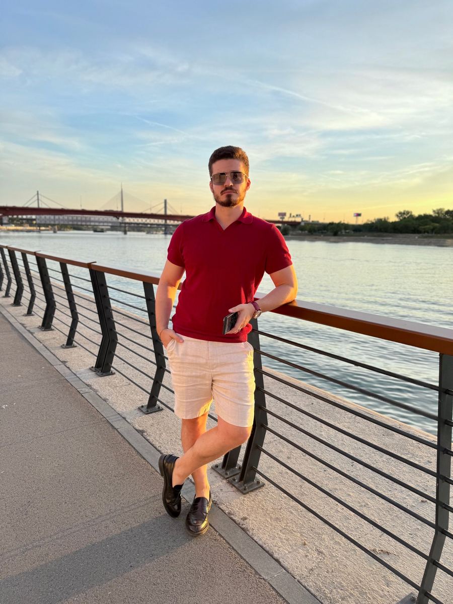 Red knit polo with linen shorts and loafers